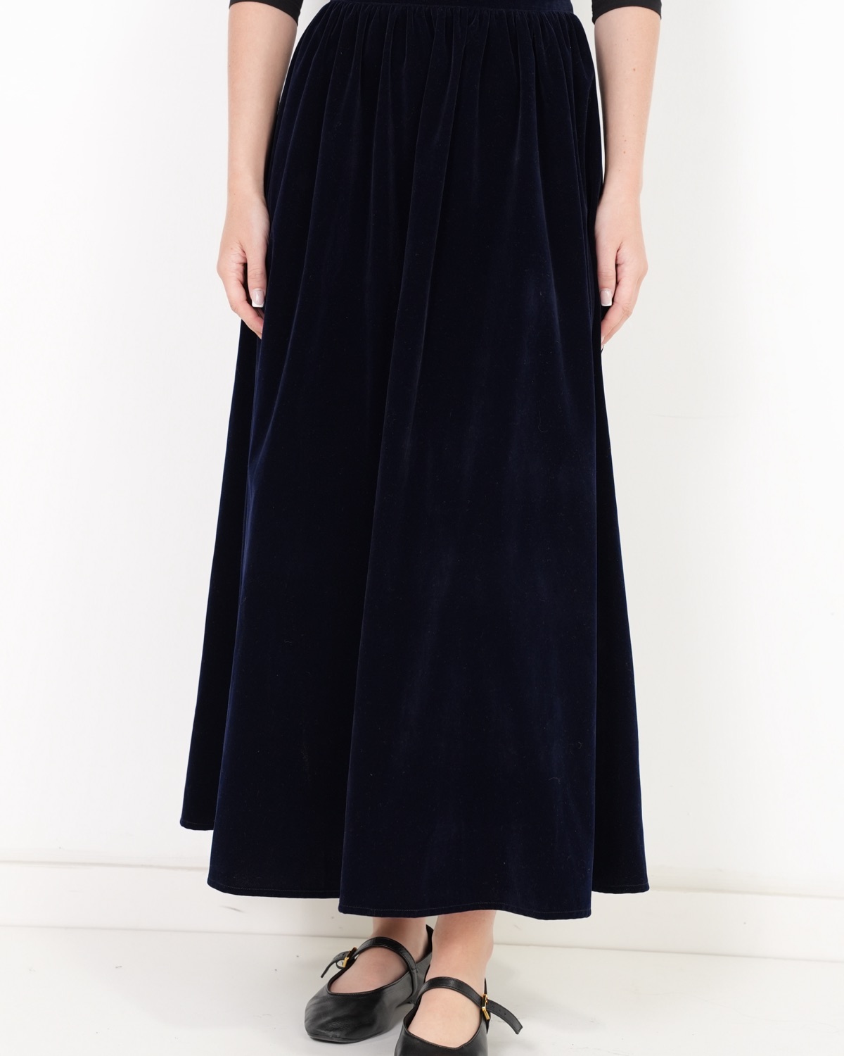 Midnight velvet maxi skirt falling in soft folds